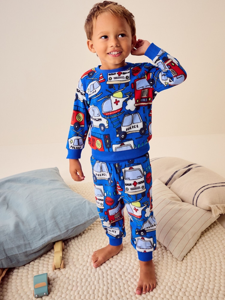 Rojo/azul con vehículos de emergencia - Pijama de felpa suave al tacto con elastano (9 meses -12 año) - Imagen 1 de 8 Rojo/azul con vehículos de emergencia - Pijama de felpa suave al tacto con elastano (9 meses -12 año) - Imagen 1 de 8