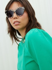 Oliver Bonas Green Milky Faux Fur Tortoiseshell Cat Eye Sunglasses - Image 1 of 8