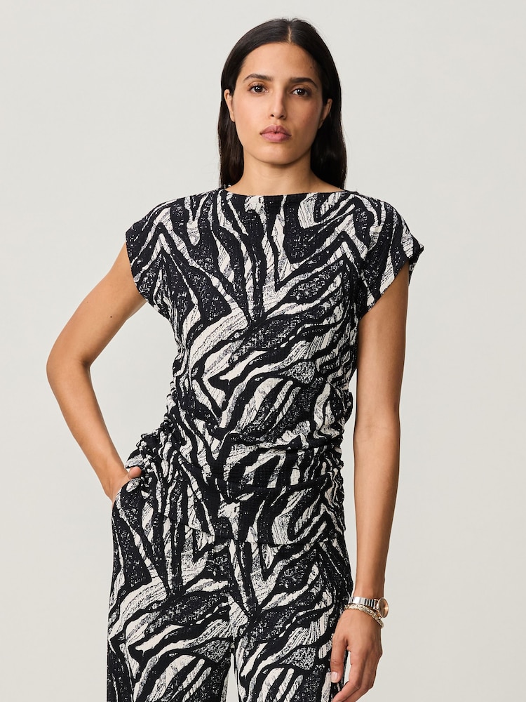 Black/White Zebra Print Textured Ruched Side Short Sleeve Top - Image 1 of 7 Black/White Zebra Print Textured Ruched Side Short Sleeve Top - Image 1 of 7