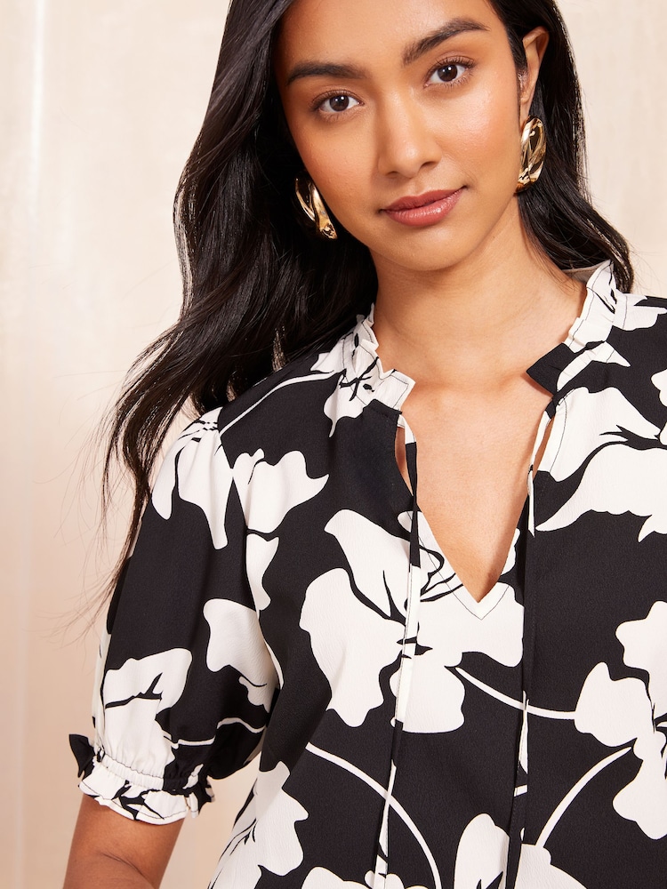 Friends Like These Black/White Short Sleeve Woven Tie Neck Blouse - Image 2 of 4