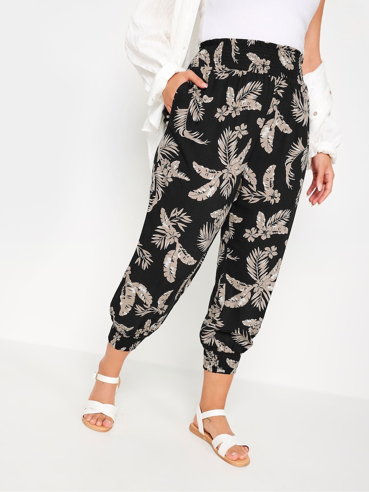 Yours Curve Black Leaf Print Shirred Harem Trousers - Image 1 of 5