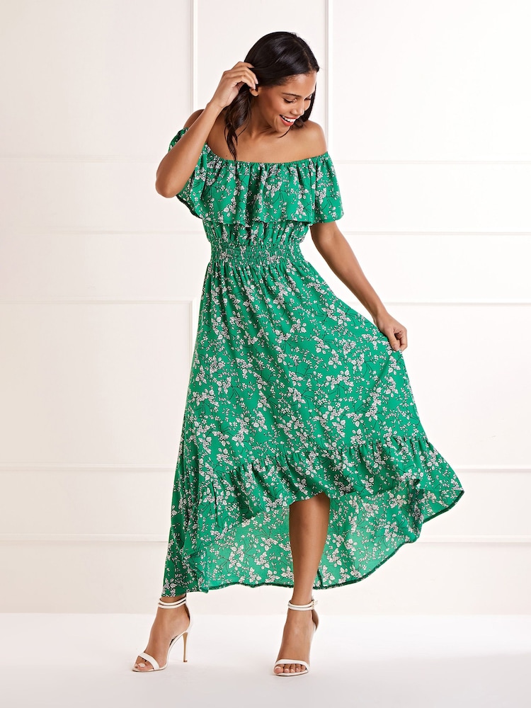 Grün - Mela Geblümtes Kleid mit Carmen-Ausschnitt und verlängertem Rückensaum - Bild 1 von 4 Grün - Mela Geblümtes Kleid mit Carmen-Ausschnitt und verlängertem Rückensaum - Bild 1 von 4