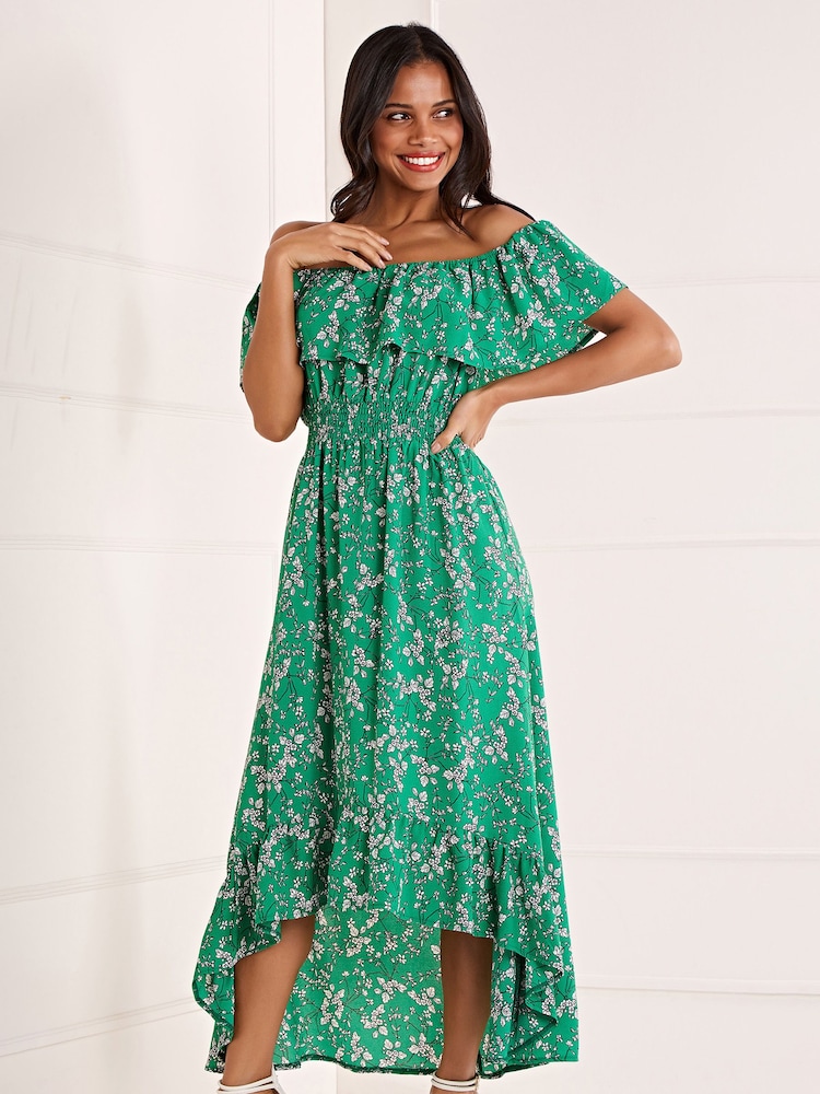 Grün - Mela Geblümtes Kleid mit Carmen-Ausschnitt und verlängertem Rückensaum - Bild 2 von 4 Grün - Mela Geblümtes Kleid mit Carmen-Ausschnitt und verlängertem Rückensaum - Bild 2 von 4