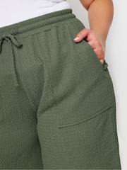 Yours Curve Green Crinkle Runner Shorts - Image 4 of 5