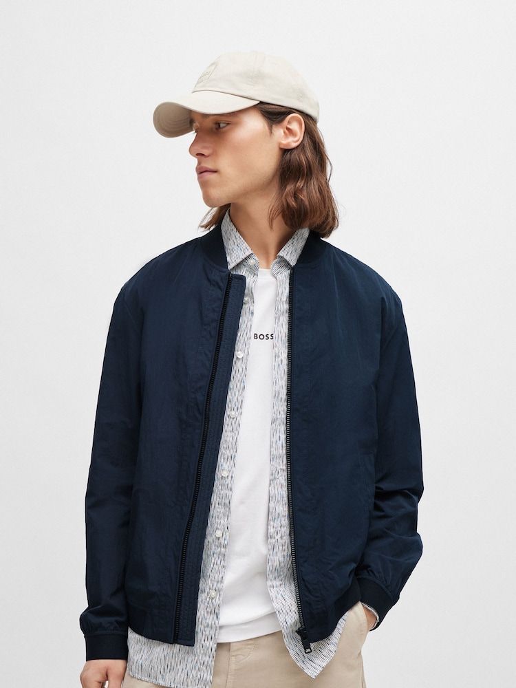 BOSS Navy Blue Water Repellent Crinkle Effect Bomber Style Jacket - Image 1 of 6 BOSS Navy Blue Water Repellent Crinkle Effect Bomber Style Jacket - Image 1 of 6