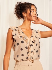 Friends Like These Black/White Sleeveless Ruffle Tie Front Woven Blouse - Image 1 of 4