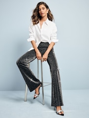 Silver Metallic Power Sculpting Ponte Flare Leggings - Image 1 of 9
