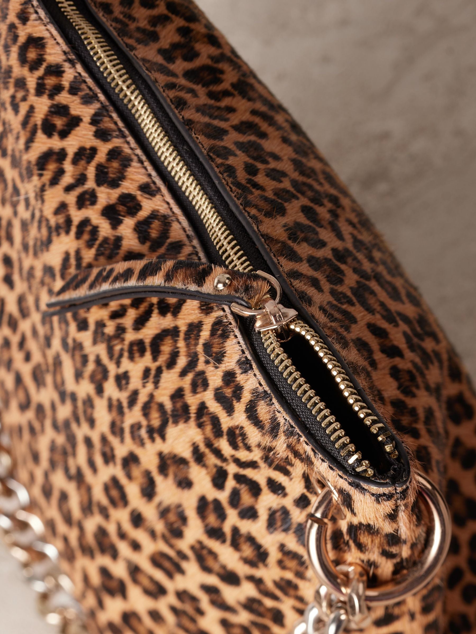 Leopard print clutch bag with chain clearance
