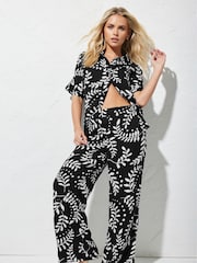 PixieGirl Petite Black Leaf Print Wide Leg 100% Cotton Trousers - Image 1 of 5
