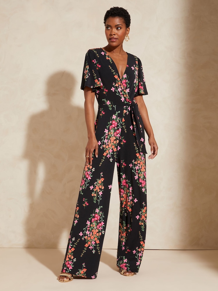 Love & Roses Black Floral Twist Front Jersey Jumpsuit - Image 1 of 4