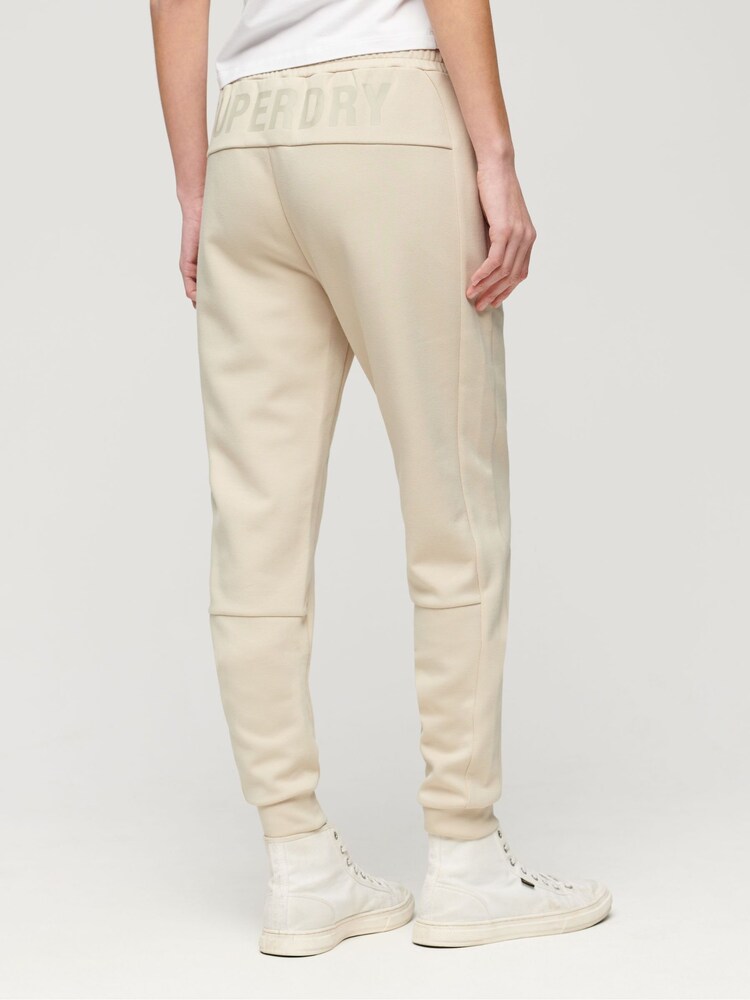 Superdry Nude Slim Sports Tech Joggers - Image 2 of 4 Superdry Nude Slim Sports Tech Joggers - Image 2 of 4