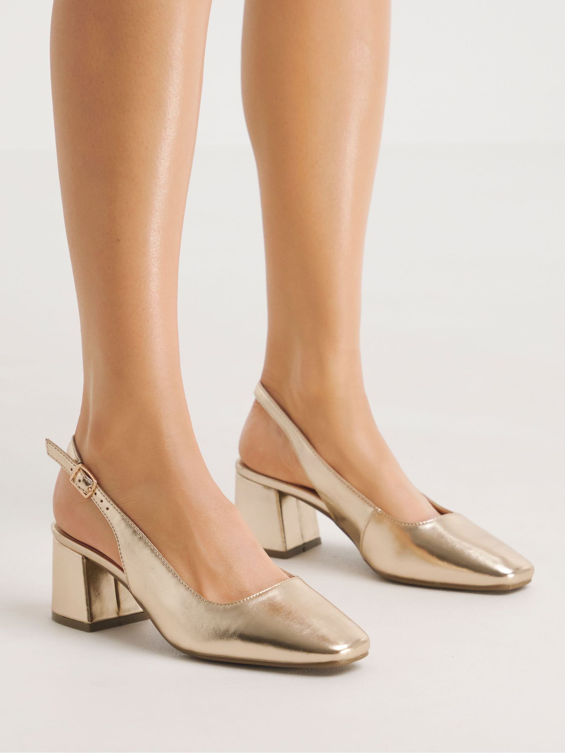 Wide heel pumps on sale
