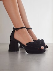 Black Forever Comfort® Platform Flare Bow Sandals - Image 1 of 9