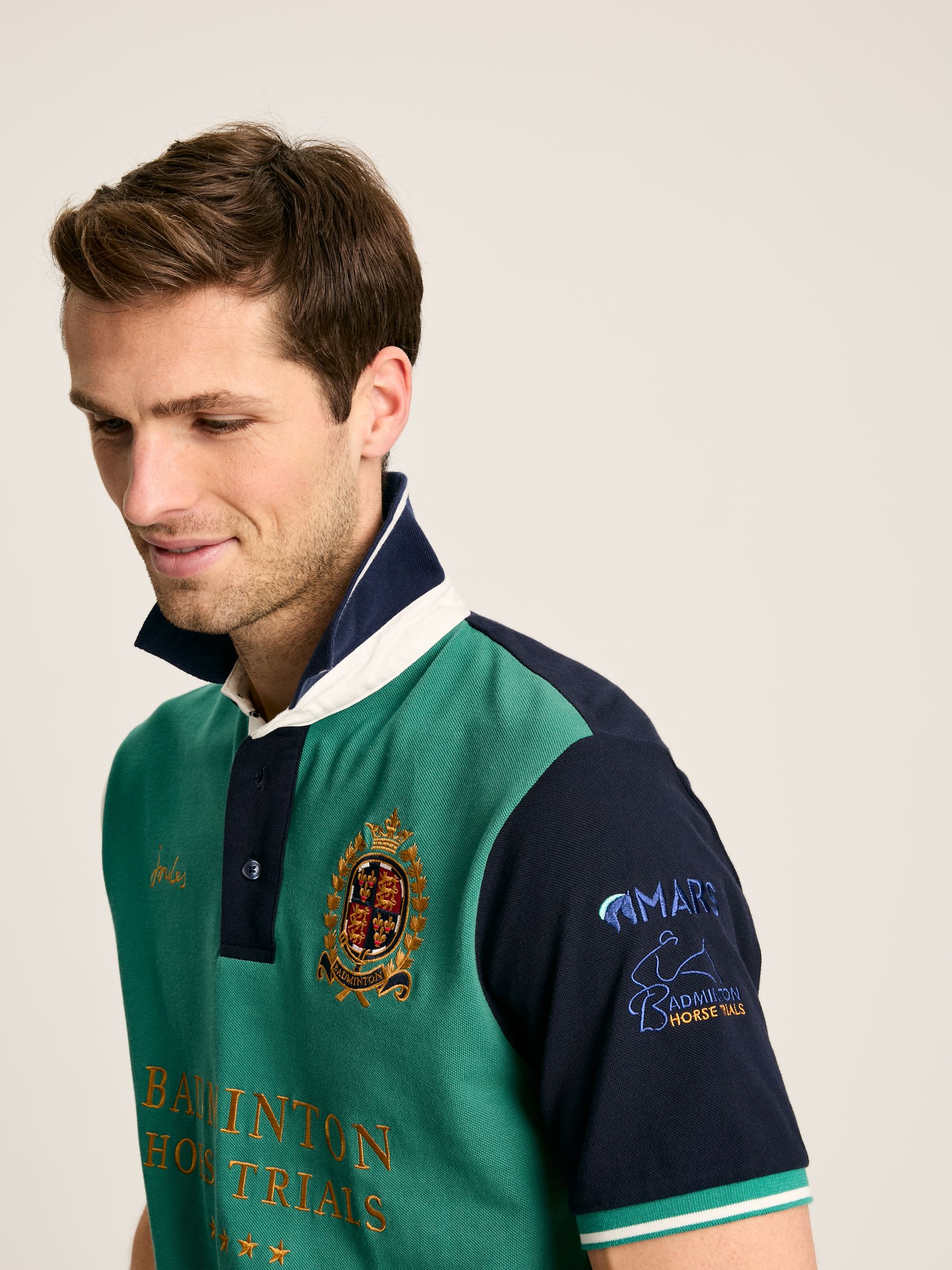 Buy Joules Official Badminton Green & Navy Polo Shirt from the