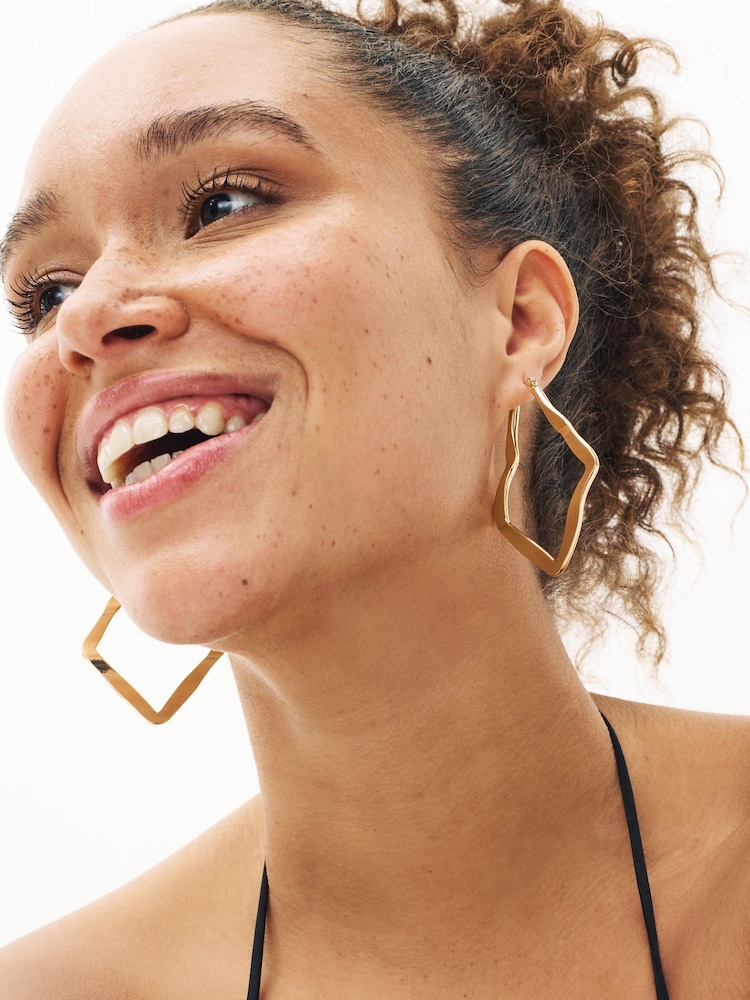Gold Tone Organic Hoop Earrings - Image 1 of 3 Gold Tone Organic Hoop Earrings - Image 1 of 3