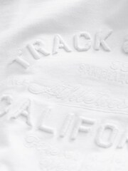 أبيض/أخضر - تيشرت بكم قصير تلبيس رشيق بشعار - صورة 6 من 6