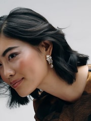 CERENE Luma Clear Gold Tone Statement Crystal Drop Earrings - Image 2 of 6