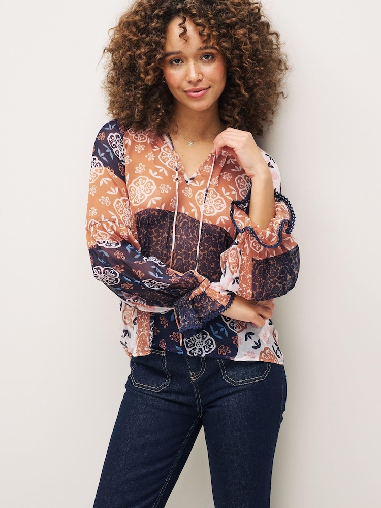 Navy Blue Patch Print Long Sleeve V-Neck Sheer Blouse with Lace Trim Detail - Image 1 of 5