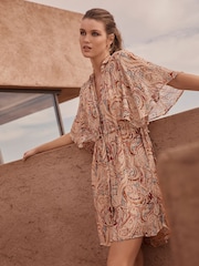 Ecru Cream Sparkle Paisley Print Flutter Sleeve Tie Waist Mini Dress - Image 1 of 2