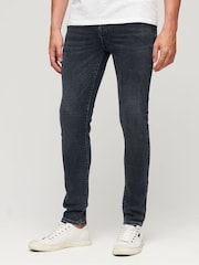Темно-синий - Хлопковые джинсы скинни Superdry - Изображение 4 из 10
