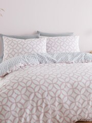 Catherine Lansfield Pink Geo Trellis Reversible Duvet Cover and Pillowcase Set - Image 1 of 4