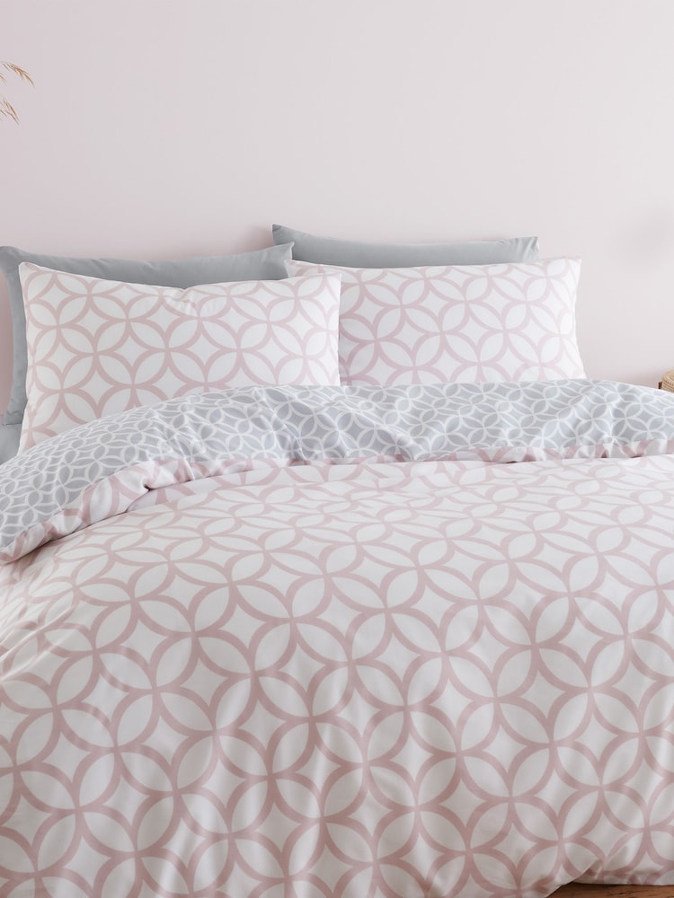 Catherine Lansfield Pink Geo Trellis Reversible Duvet Cover and Pillowcase Set - Image 1 of 4