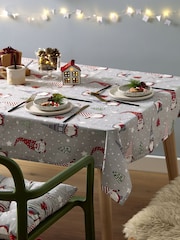Catherine Lansfield Red Christmas Gnomes Wipeable 100% Cotton Table Cloth - Image 1 of 3
