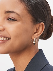 Gold Tone Crossover Hoop Earrings - Image 1 of 3