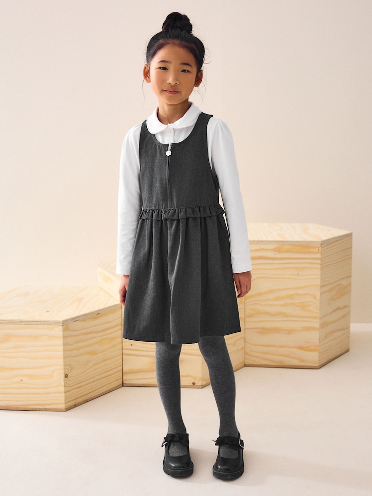 Gris - Vestido pichi escolar con cremallera frontal y cintura con volantes (3-14 años) - Imagen 1 de 6 Gris - Vestido pichi escolar con cremallera frontal y cintura con volantes (3-14 años) - Imagen 1 de 6