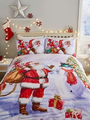 Juego de funda nórdica y funda de almohada con diseño navideño de Santa y un muñeco de nieve de Fusion - Imagen 1 de 4