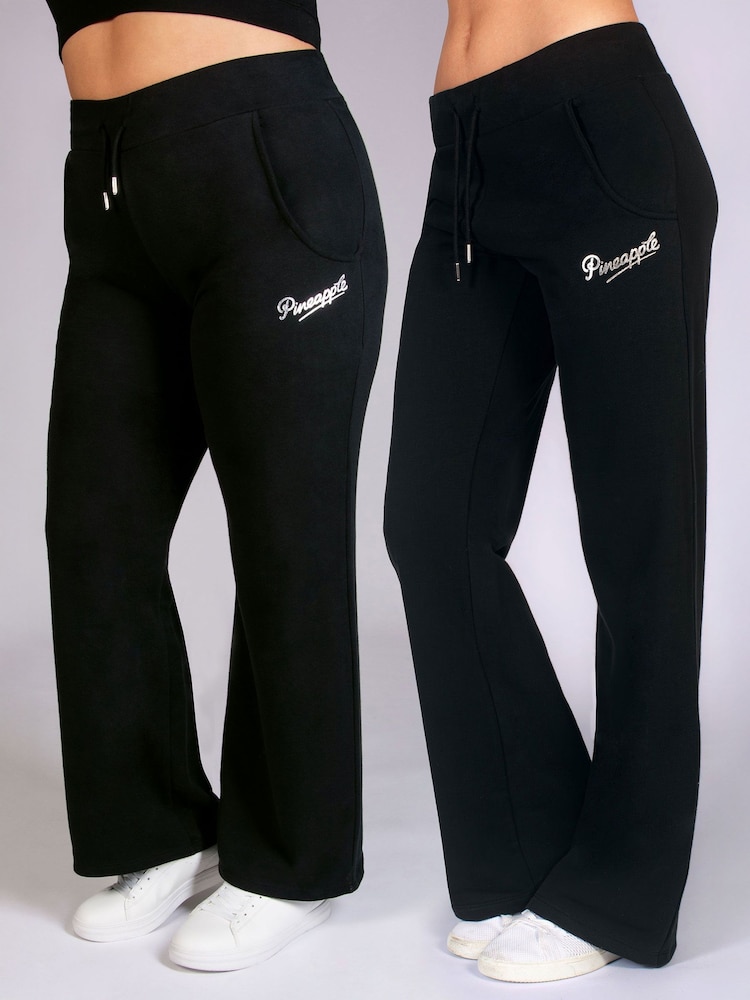 Schwarz - Pineapple Damen Basic-Jogginghose mit weitem Bein - Bild 1 von 8 Schwarz - Pineapple Damen Basic-Jogginghose mit weitem Bein - Bild 1 von 8