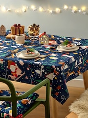 Catherine Lansfield Blue Santas Christmas Wonderland Wipeable 100% Cotton Table Cloth - Image 1 of 3