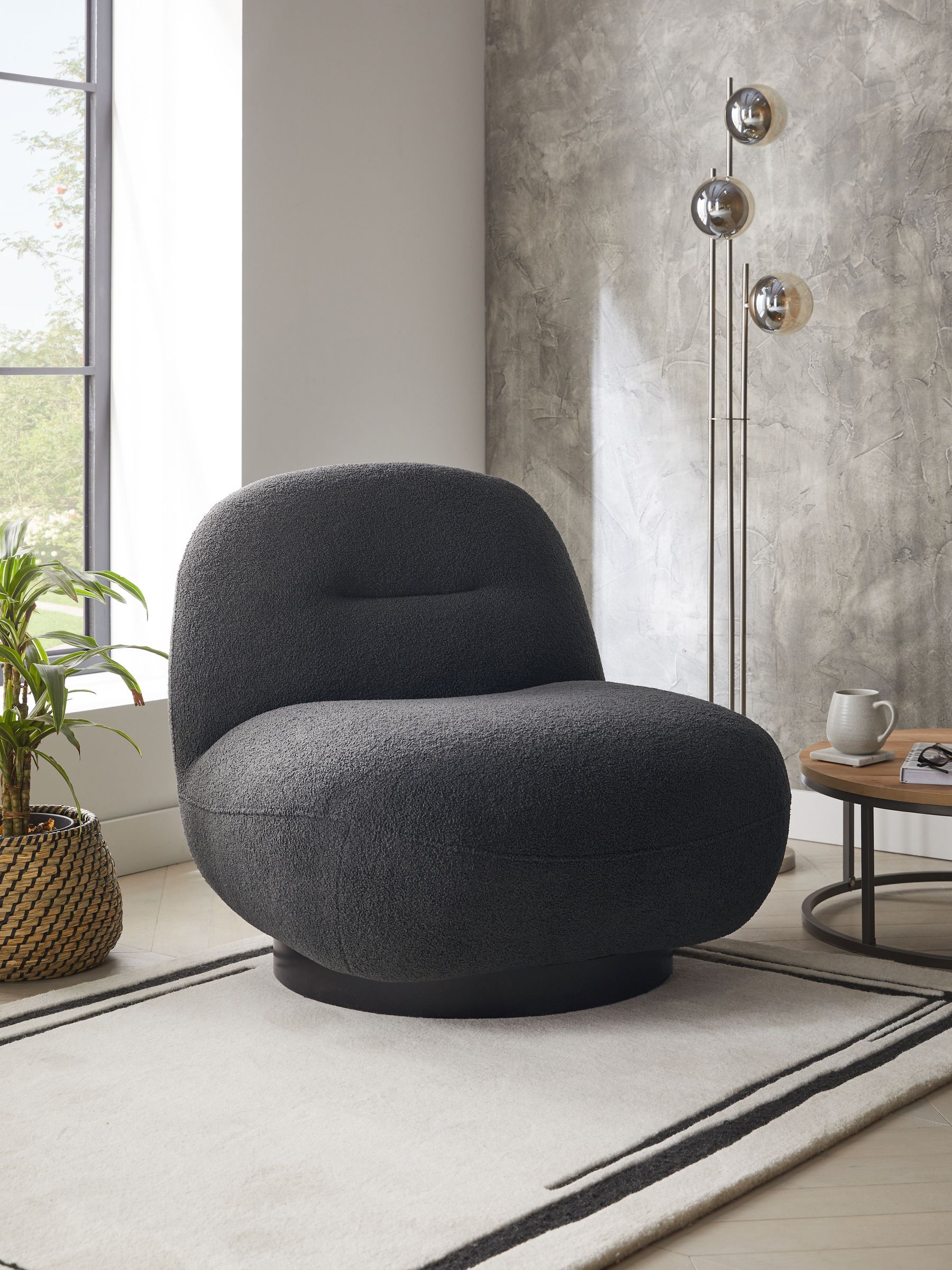 Buy Soft Cosy Boucle Black Otis Swivel Accent Chair from the Next UK online shop