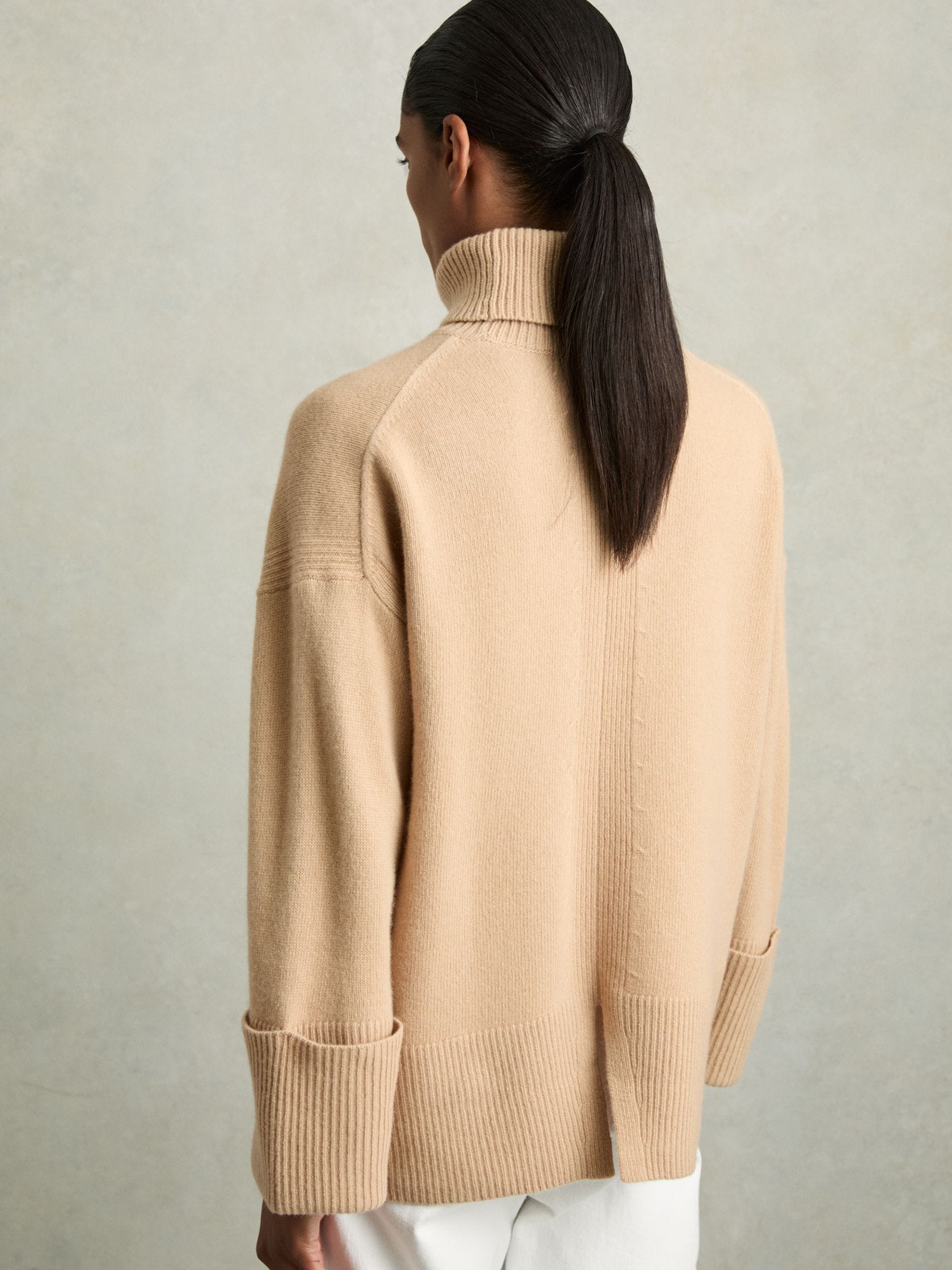 Roll neck camel jumper on sale