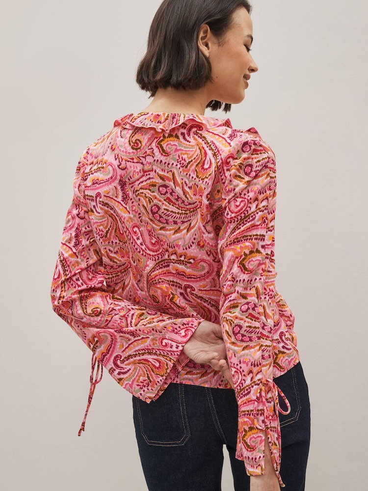 Rosa geblümt - Langärmeliges Oberteil mit Bindeband vorn und Rüschen - Bild 2 von 4 Rosa geblümt - Langärmeliges Oberteil mit Bindeband vorn und Rüschen - Bild 2 von 4