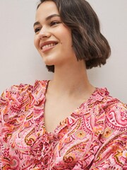 Rosa geblümt - Langärmeliges Oberteil mit Bindeband vorn und Rüschen - Bild 3 von 4
