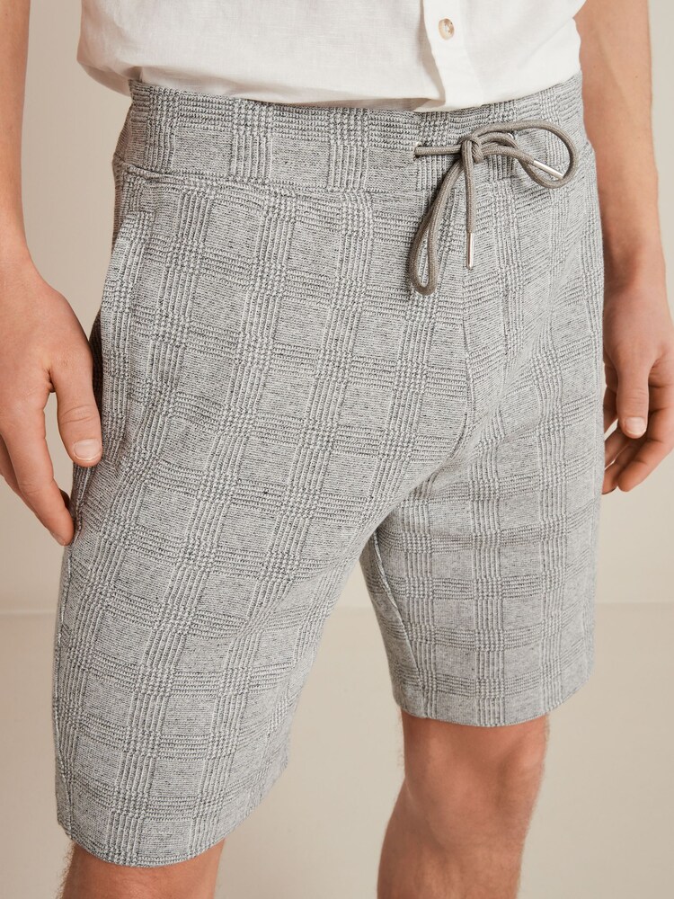 Grau - Jersey-Shorts mit Karomuster - Bild 1 von 5