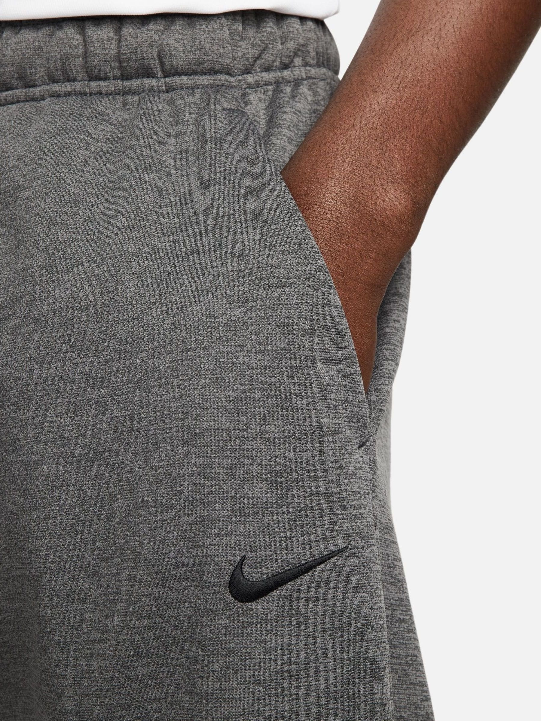 nike training tall therma tapered joggers in grey