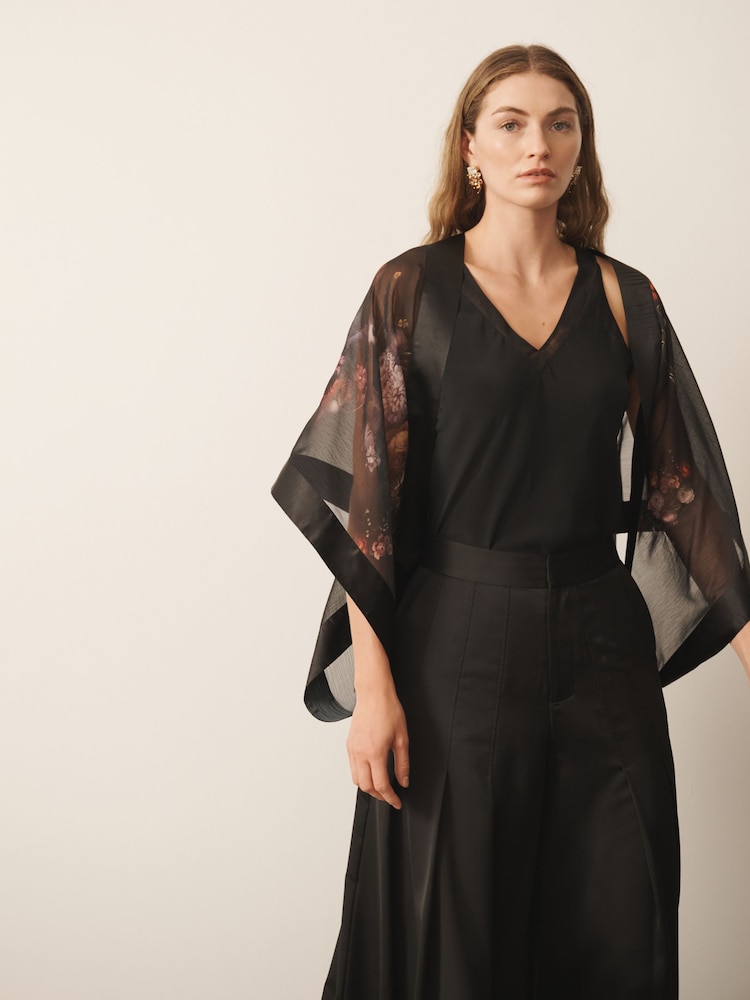 CERENE Jane Black Majestic Floral Print Sheer Cape Cover-Up With Satin Trim - Image 1 of 9 CERENE Jane Black Majestic Floral Print Sheer Cape Cover-Up With Satin Trim - Image 1 of 9