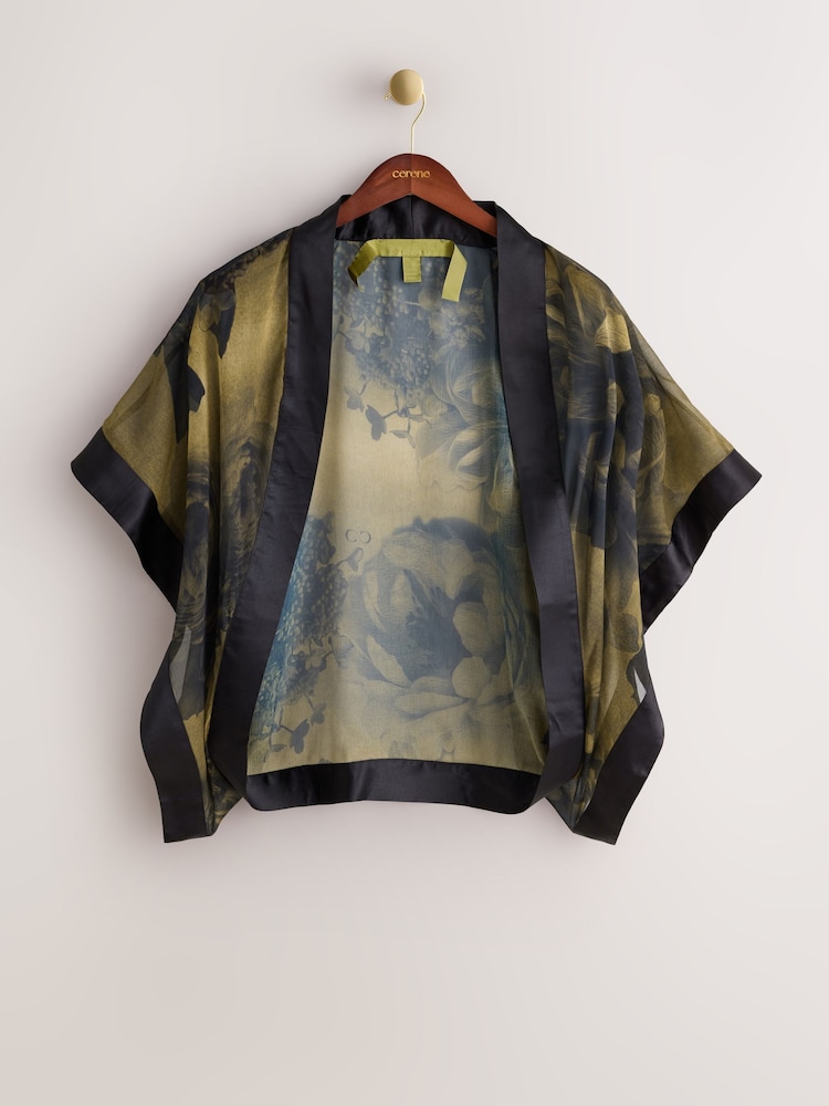 CERENE Jane Gold Cerenity Floral Print Sheer Cape Cover-Up With Satin Trim - Image 2 of 10 CERENE Jane Gold Cerenity Floral Print Sheer Cape Cover-Up With Satin Trim - Image 2 of 10