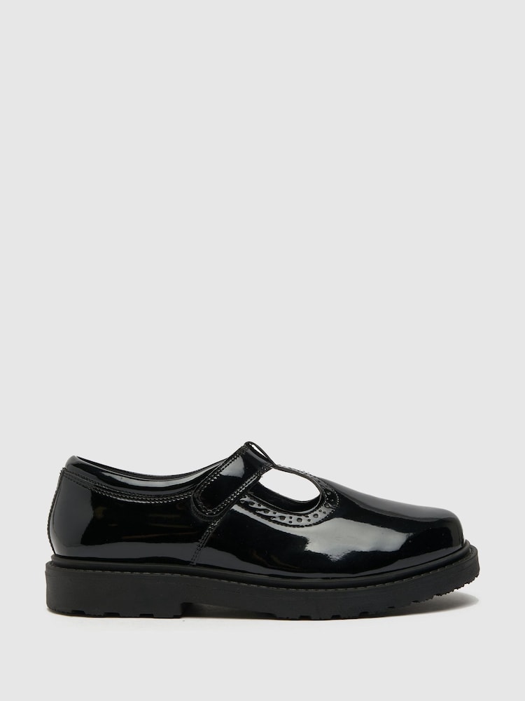 Nizki črni lakasti čevlji s T-paščkom Schuh - Slika 1 iz 4 Nizki črni lakasti čevlji s T-paščkom Schuh - Slika 1 iz 4