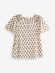 Ecru Cream Print Smocked Short Sleeves Round Neck Top - Image 1 of 4
