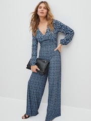Blue Leopard Print Long Sleeve Bow Back V-Neck Jumpsuit - Image 1 of 4