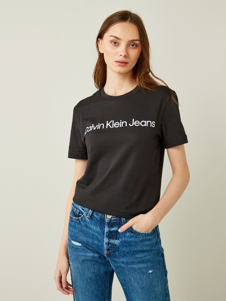 Calvin Klein Jeans Slim 100% Cotton Institutional Black Logo T-Shirt - Image 1 of 4 Calvin Klein Jeans Slim 100% Cotton Institutional Black Logo T-Shirt - Image 1 of 4