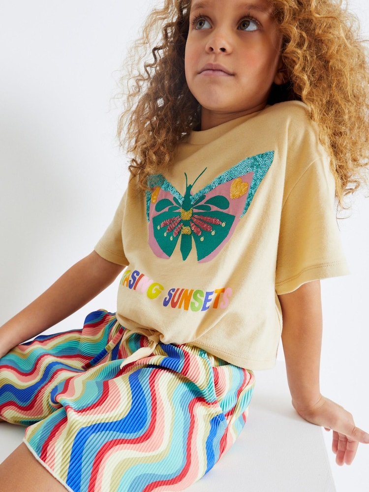 Mehrfarbig/Pastell - Set aus T-Shirt zum Binden vorn und Shorts mit Bügelfalten (3-16 Jahre) - Bild 1 von 6