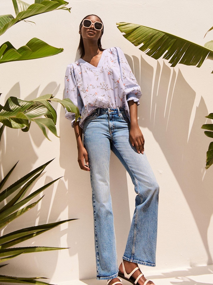 Mid Blue Denim Cotton Rich, Low Rise and Relaxed Fit Bootcut Jeans - Image 1 of 4