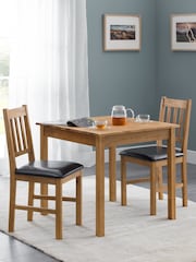 Julian Bowen Brown Coxmoor Solid Oak Compact 4 Seater Dining Table - Image 1 of 4
