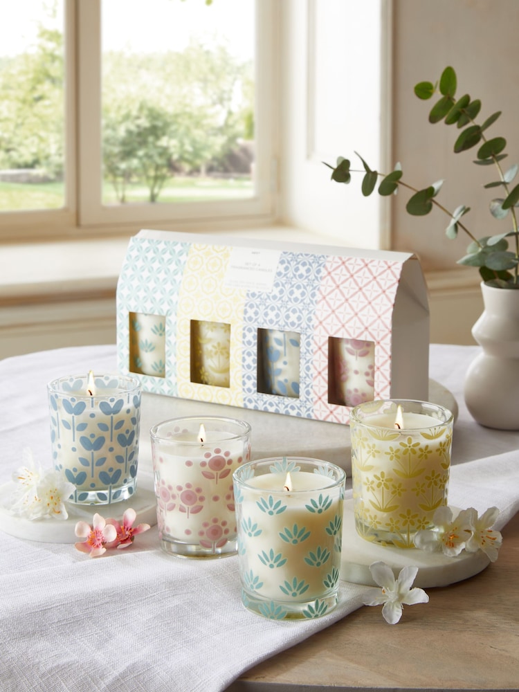 Set of 4 White Scented Votive Candles - Image 1 of 2 Set of 4 White Scented Votive Candles - Image 1 of 2