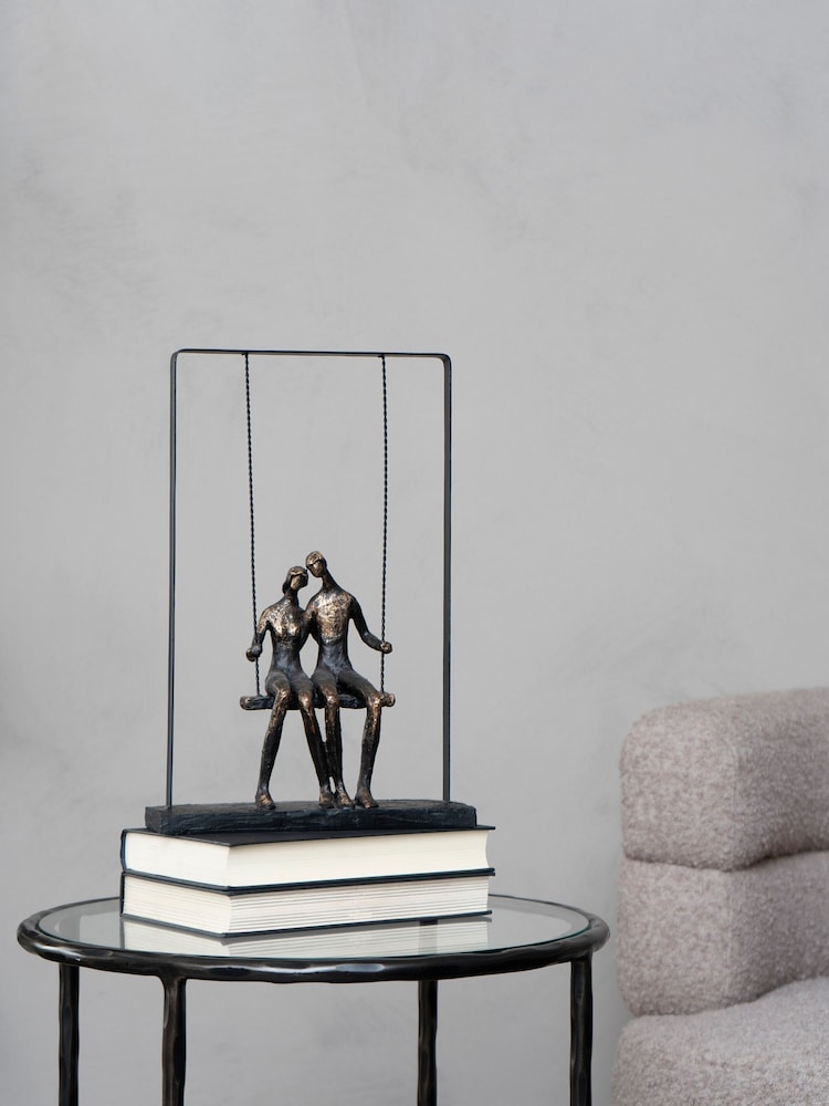 Libra Interiors Bronze Couple Sitting On Swing Bronze Ornaments Sculpture - Image 1 of 2