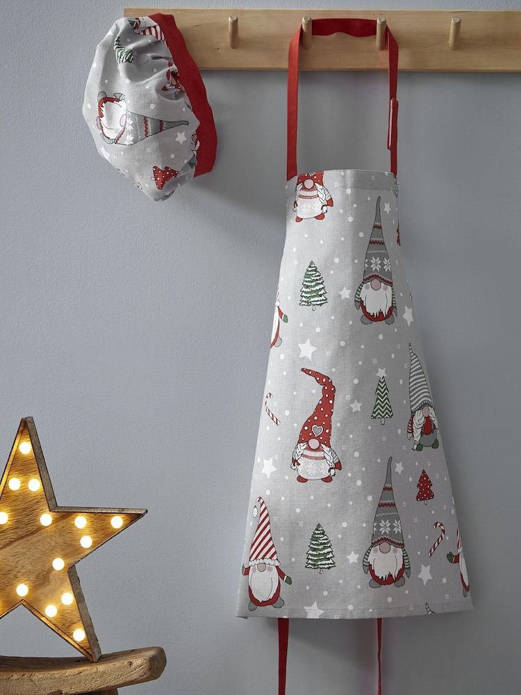 Delantal y gorro a juego de algodón 100 % con diseño navideño de gnomos para niños de Catherine Lansfield - Imagen 1 de 2